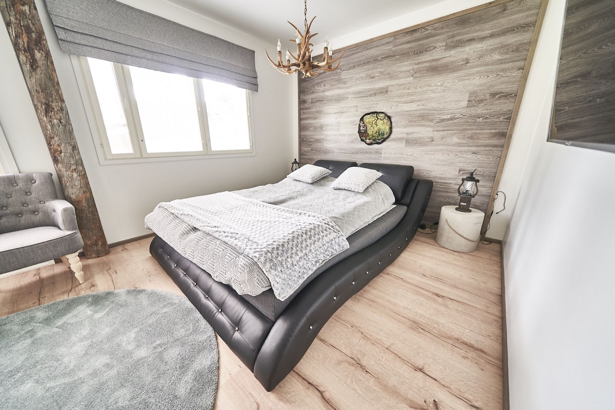 Romantic Apartment, 1 Bedroom, Sauna | Living room | 50-inch flat-screen TV with cable channels, Smart TV