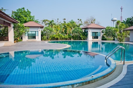 Outdoor pool, open 8:00 AM to 7:00 PM, sun loungers