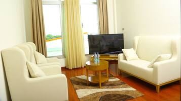 32-inch flat-screen TV with satellite channels, TV