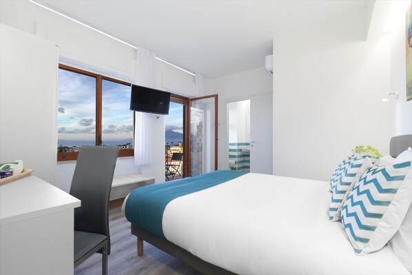 Deluxe Double Room, Terrace, Sea View | Minibar, in-room safe, desk, laptop workspace - Sirocco Suites (Sant'Agnello)