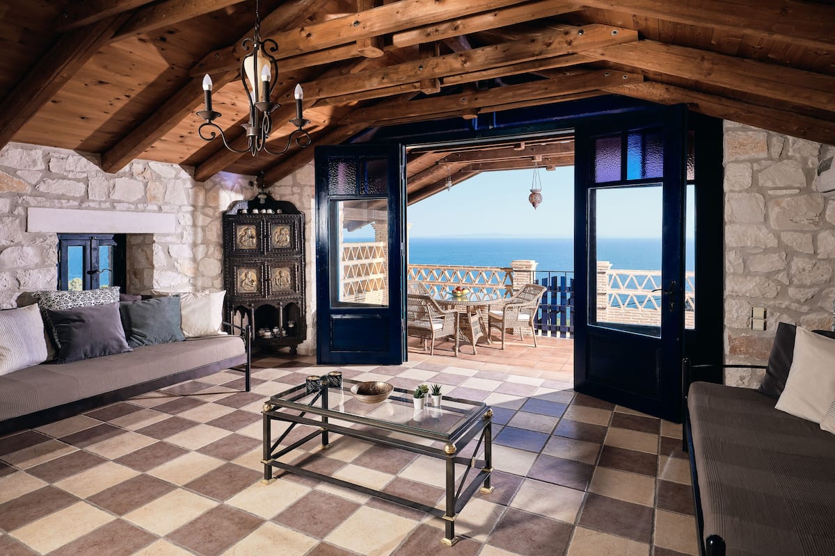 Deluxe Suite, 2 Bedrooms, Sea View | Living area | Flat-screen TV
