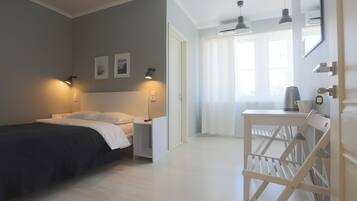 Standard Double Room | Living room | Flat-screen TV