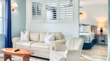 Deluxe Room, 1 King Bed, River View | 1 bedroom, blackout curtains, soundproofing, iron/ironing board