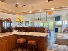 Panoramic Penthouse, River View | Living area | TV