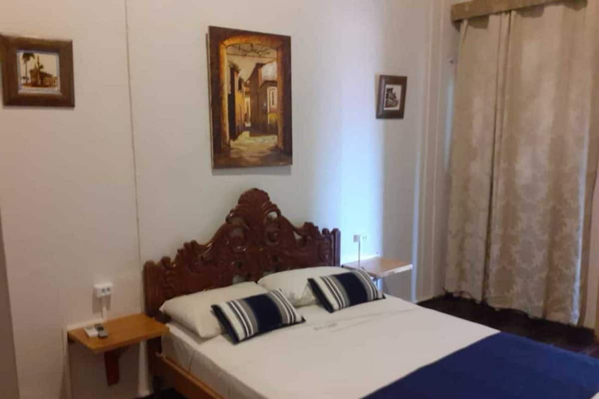Standard Room, Private Bathroom | In-room safe, individually decorated, individually furnished, desk
