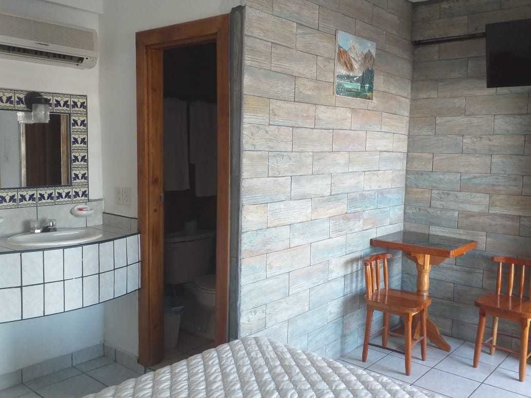 classic quadruple room, 2 double beds, non smoking | bathroom | shower, towels, soap, toilet paper