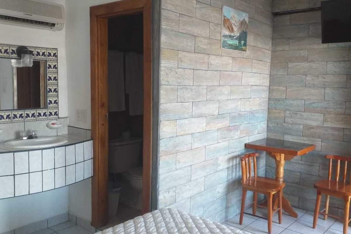 classic quadruple room, 2 double beds, non smoking | bathroom | shower, towels, soap, toilet paper