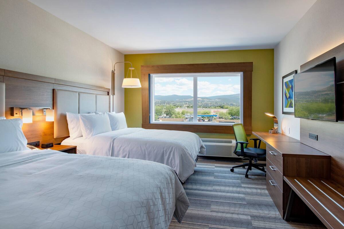 Pillow-top beds, desk, blackout curtains, iron/ironing board