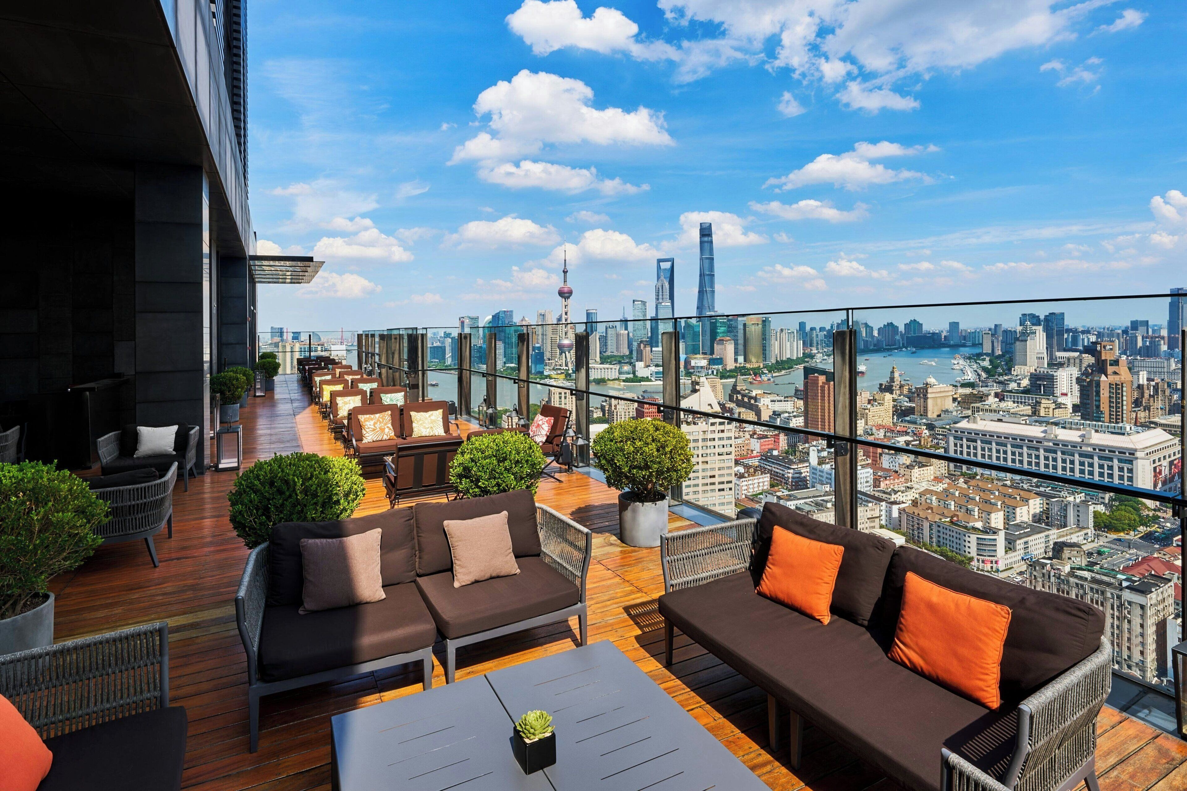 3 bars/lounges, rooftop bar, lobby lounge