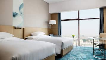 20 slaapkamers, luxe beddengoed, donzen dekbedden, een minibar