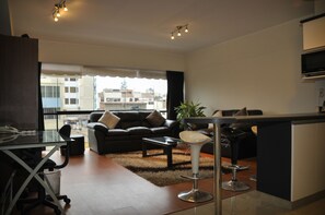 Apartment, 1 Bedroom | Living area | 50-inch Smart TV with satellite channels, TV - Miraflores4Rent Sisley (Lima)