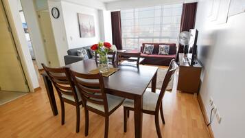 Luxury Apartment, 2 Bedrooms, City View | Living area | 50-inch Smart TV with digital channels, TV