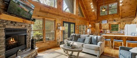 Televisio, takka, videopelejä, pöytäjalkapallopöytä