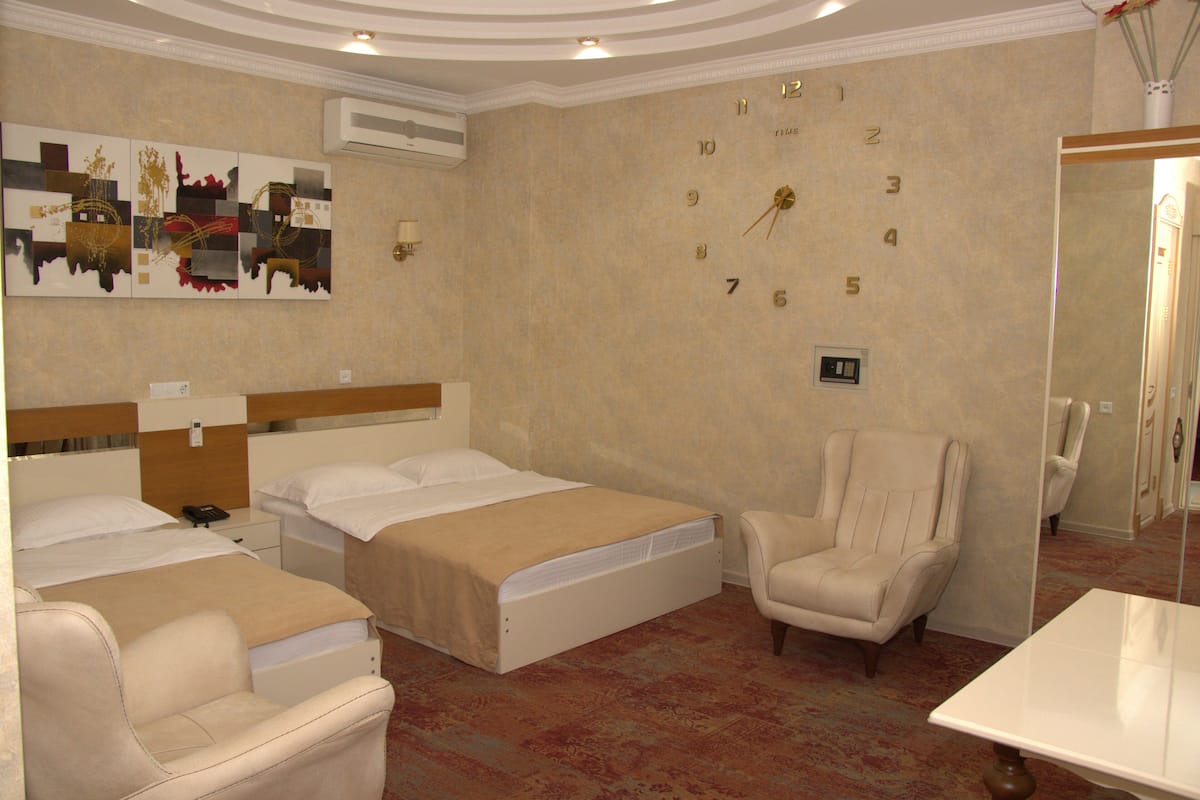 Family Quadruple Room, 1 Bedroom | 1 bedroom, premium bedding, minibar, in-room safe
