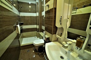 Economy Triple Room, 1 Bedroom | Bathroom | Shower, free toiletries, hair dryer, bathrobes - Hotel Agava (Tbilisi)