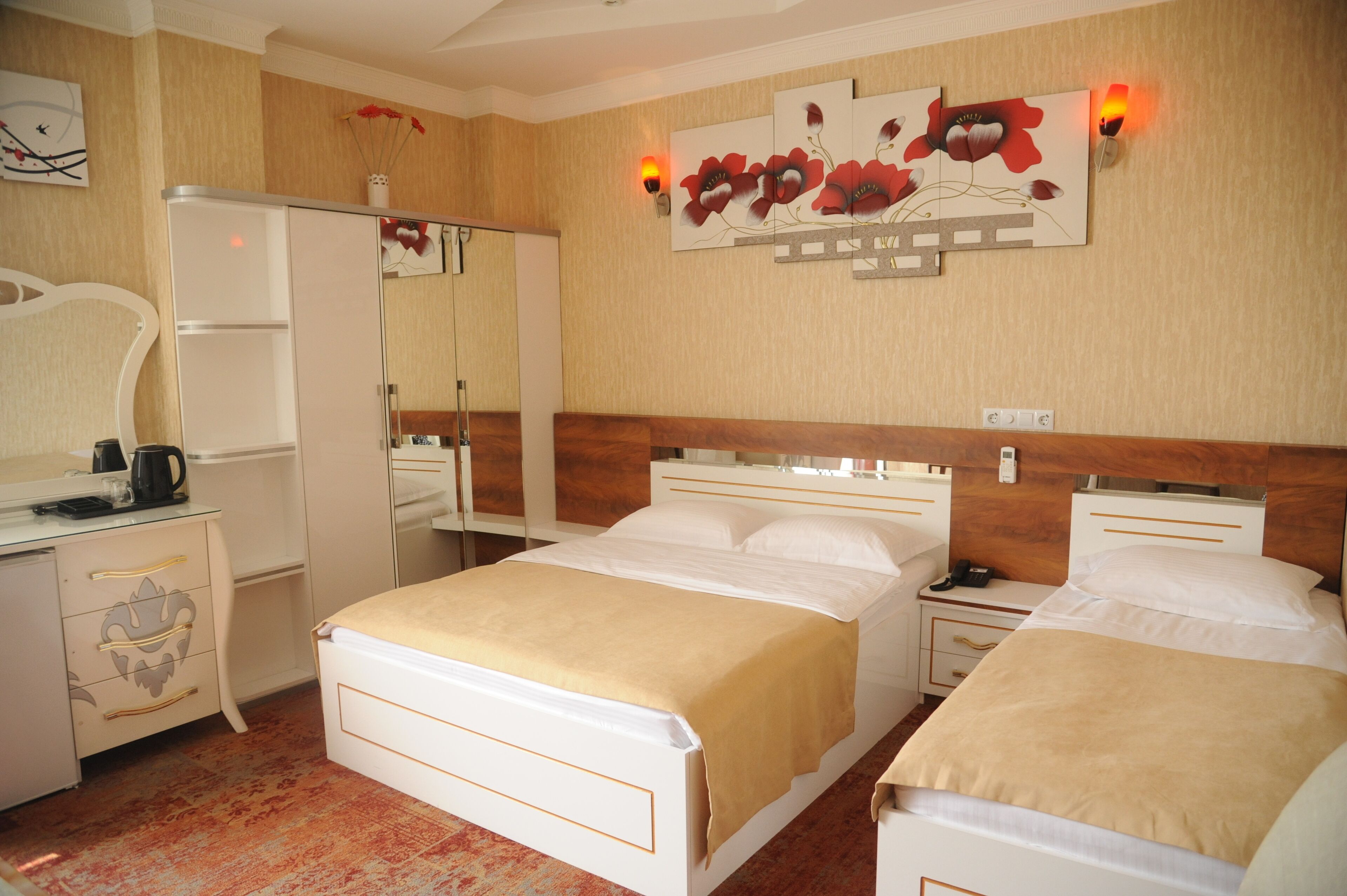 Economy Triple Room, 1 Bedroom | Premium bedding, minibar, in-room safe, desk