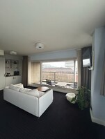 Room, Balcony (Suite) | In-room safe, iron/ironing board, free WiFi, bed sheets