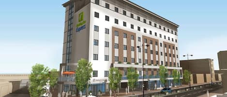 Un hôtel moderne, reconnaissable à son logo Express bien visible, avec de nombreux étages et une entrée centrale.
