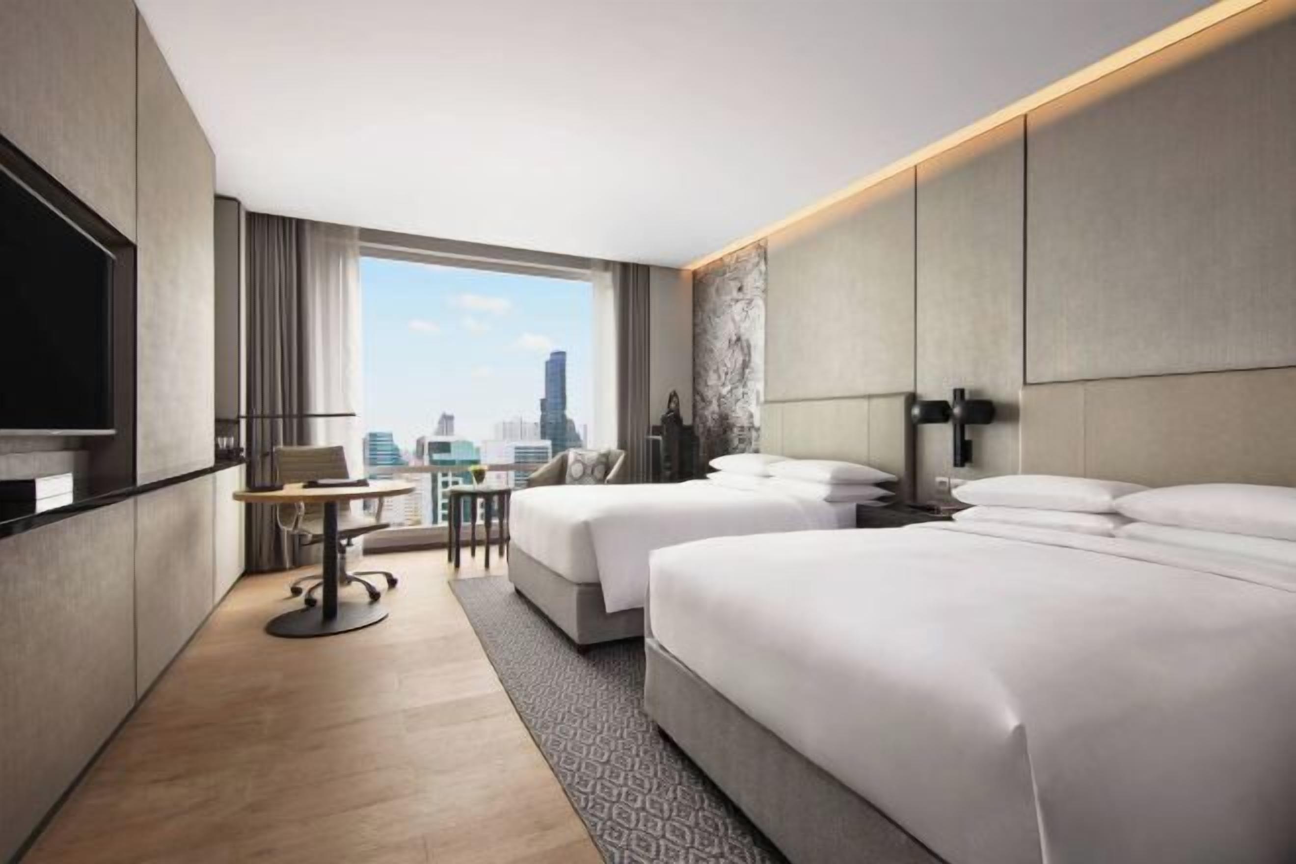 Pillow-top beds, minibar, in-room safe, desk