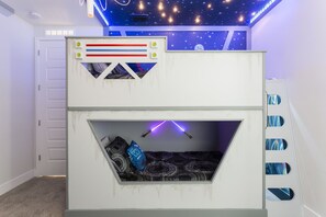 The kids will LOVE this incredible custom bunk that lights up as you walk up the ladder