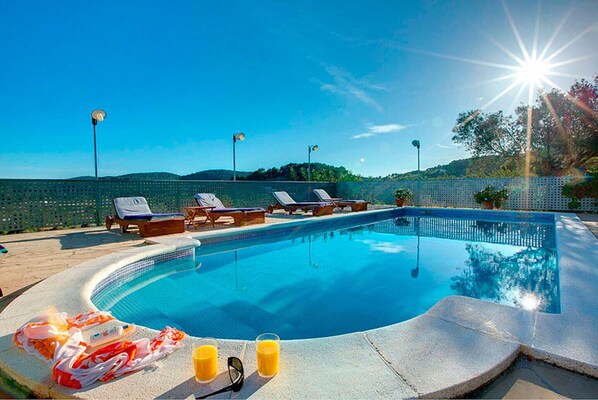 Outdoor pool, sun loungers