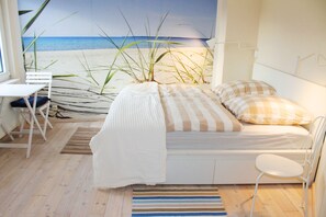 2 slaapkamers, een strijkplank/strijkijzer, reisbedje, wifi