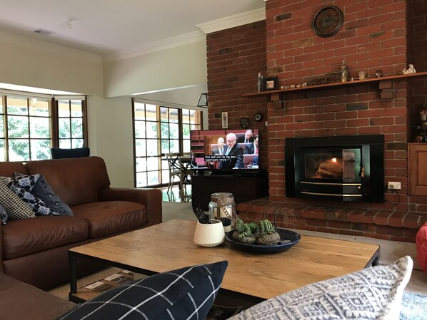 Flat-screen TV, fireplace, DVD player