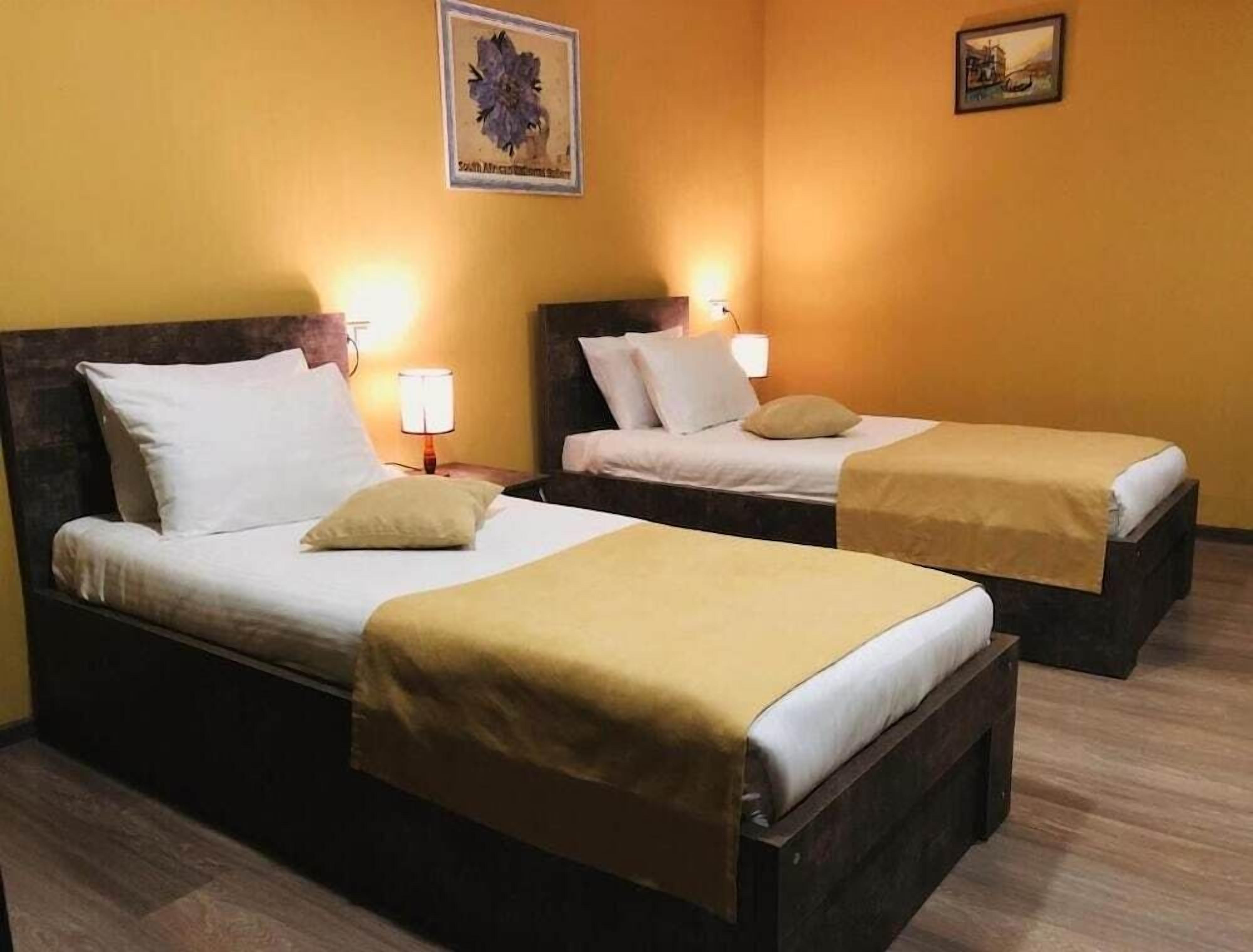 Premium bedding, desk, laptop workspace, soundproofing
