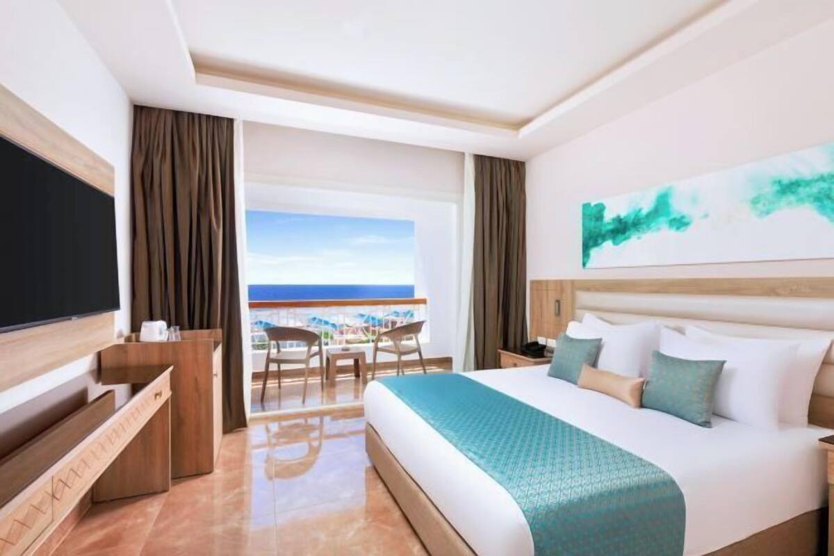 Ropa de cama de alta calidad, minibar, caja fuerte y escritorio