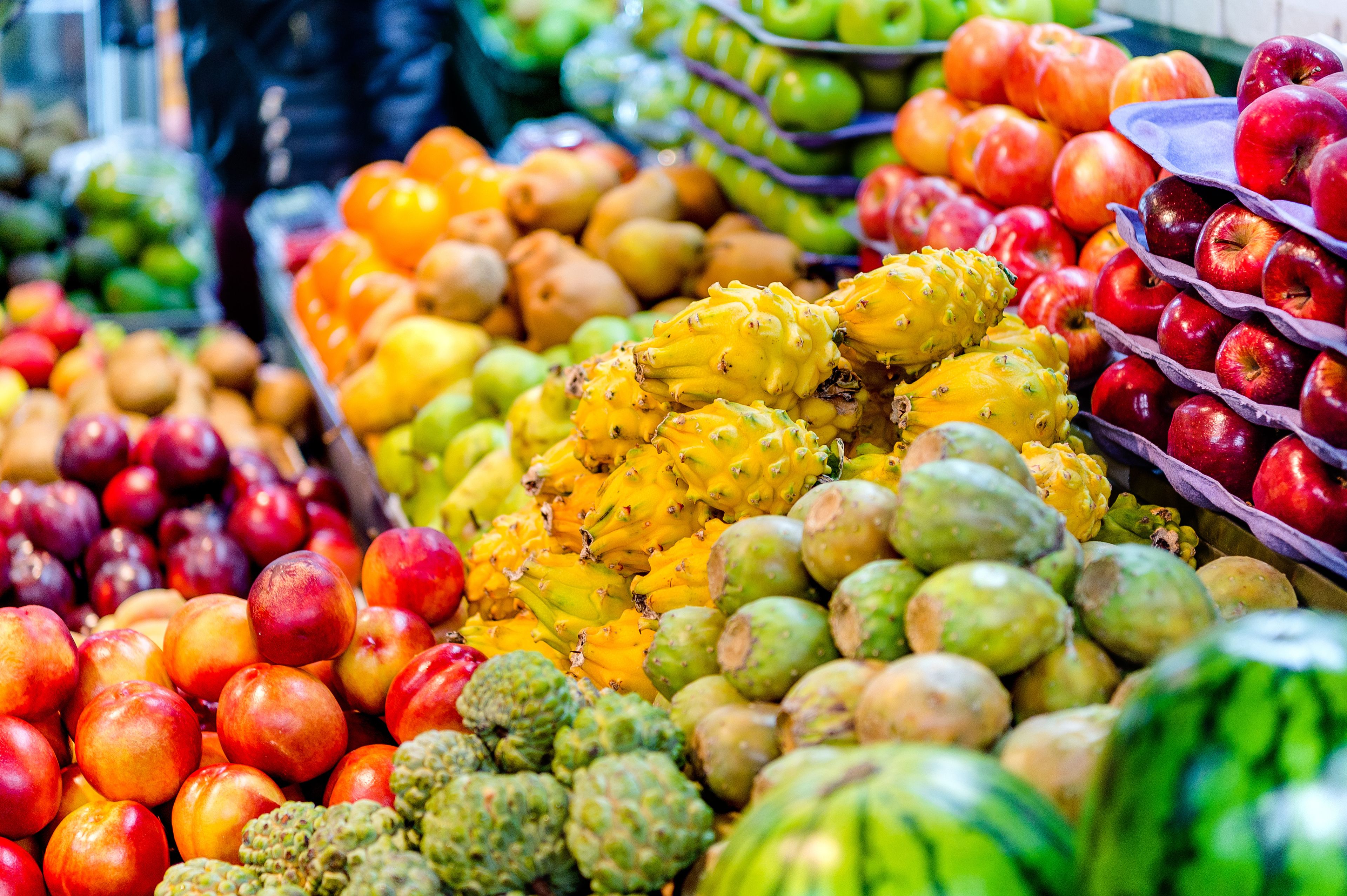 A variety of fruits including apples, bananas, and watermelons.