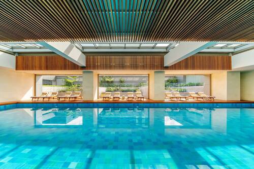 Indoor pool, open 6 AM to 8:00 PM, sun loungers, lifeguards on site