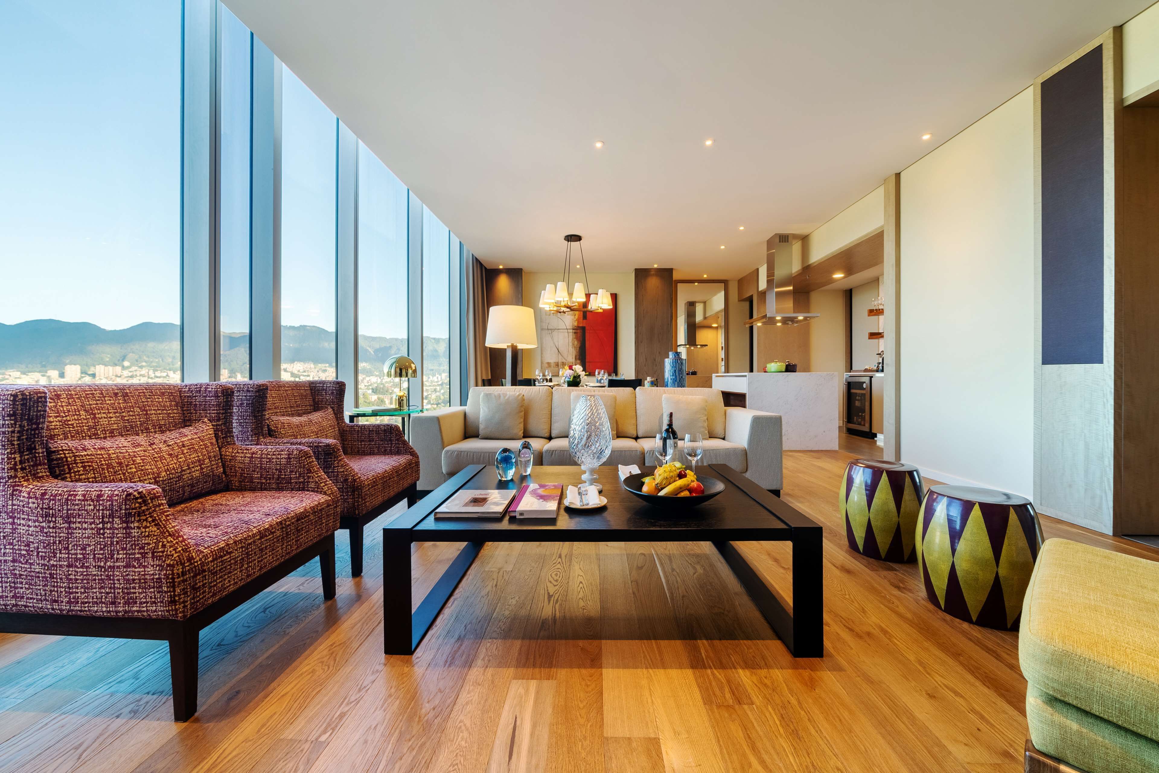 Premium bedding, down comforters, free minibar items, in-room safe