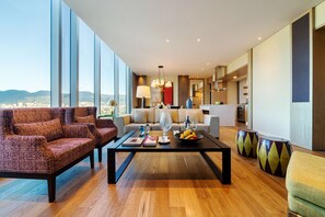 Premium bedding, down duvets, free minibar items, in-room safe