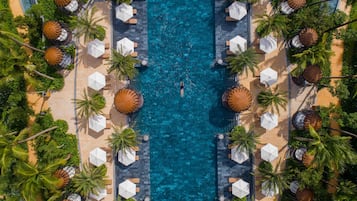 3 outdoor pools, open 7:00 AM to 7:00 PM, pool umbrellas, pool loungers