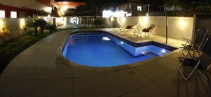 Outdoor pool, pool umbrellas, pool loungers