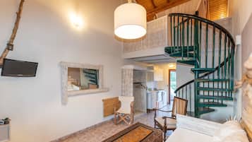 Junior Suite (Split Level) | Living area | Flat-screen TV