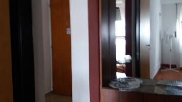 32-inch flat-screen TV with cable channels, TV