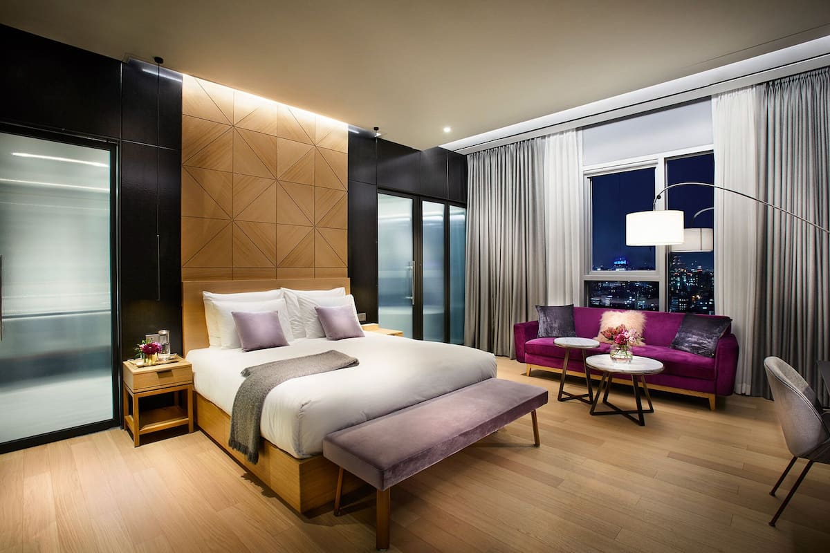 Premium bedding, down comforters, in-room safe, desk
