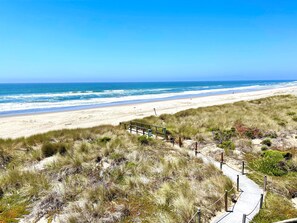 On the beach, sun-loungers, beach towels