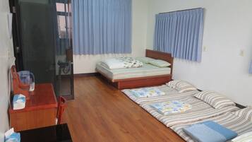 Desk, laptop workspace, blackout curtains, rollaway beds