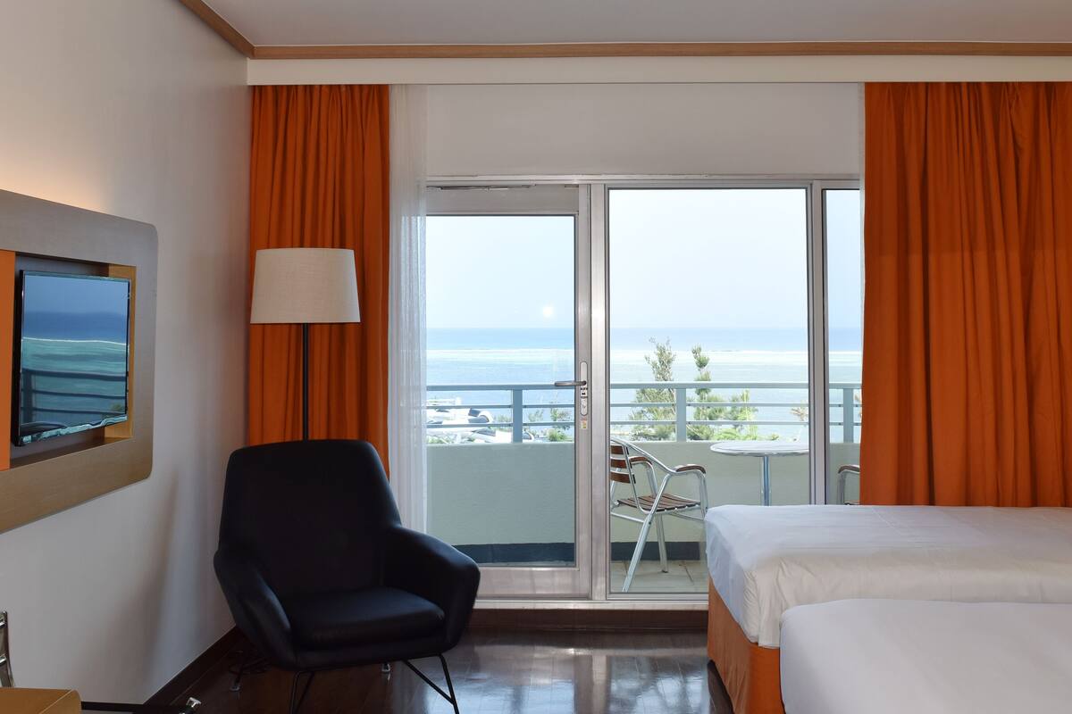 royal deluxe room, ocean view | premium bedding, in-room safe, desk, blackout curtains