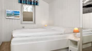 2 habitaciones, tabla de planchar con plancha y cuna de viaje