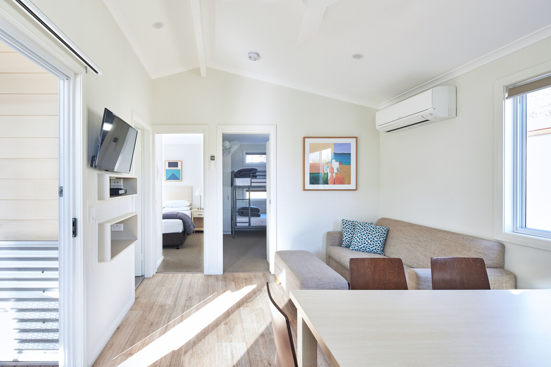 Fossicker 2 Bedroom Cabin   | Living area | Flat-screen TV