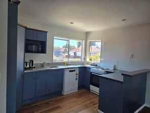 Family Apartment, 2 Bedrooms | Private kitchen | Fridge, microwave, coffee/tea maker, electric kettle - Pure Motel (Rotorua)
