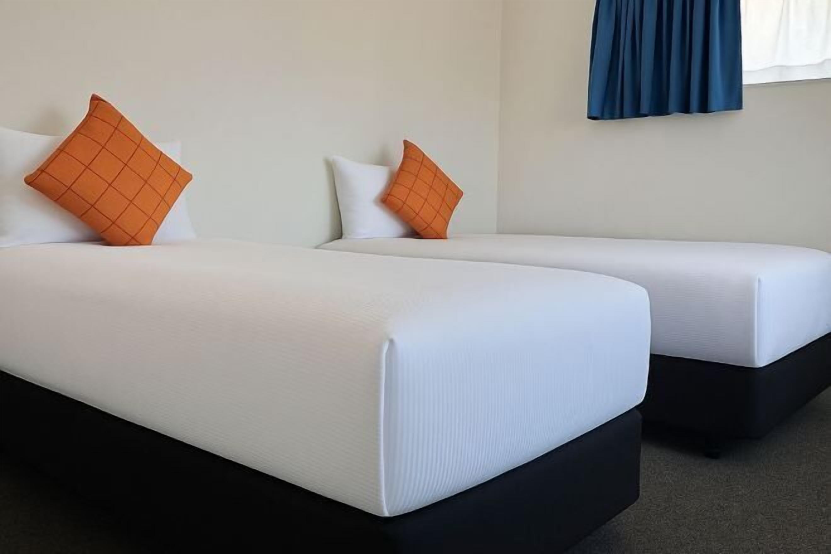 Premium bedding, pillowtop beds, free minibar, blackout drapes