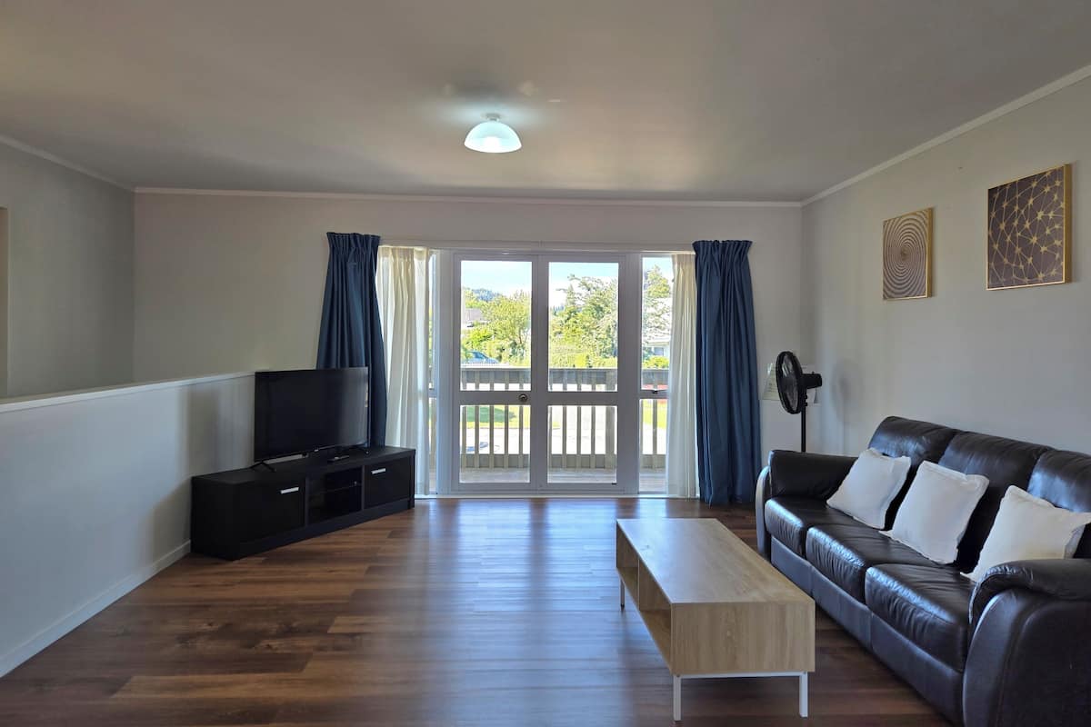 Family Apartment, 2 Bedrooms | Living area | 43-inch flat-screen TV with cable channels, TV