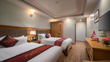 Family Triple Room | Minibar, free WiFi