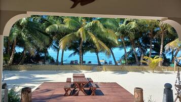 On the beach, white sand, beach towels