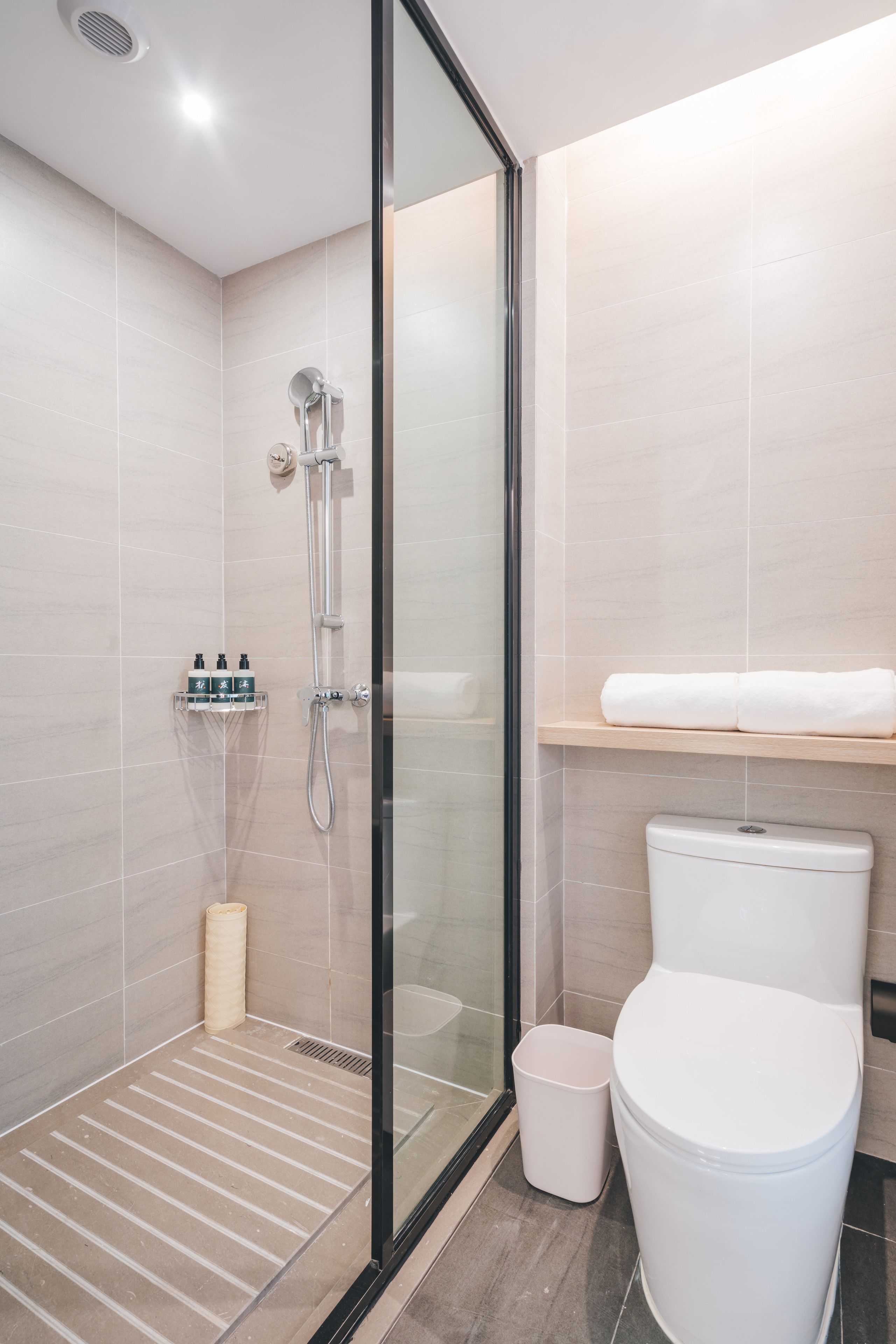 shower, hair dryer, bathrobes, towels