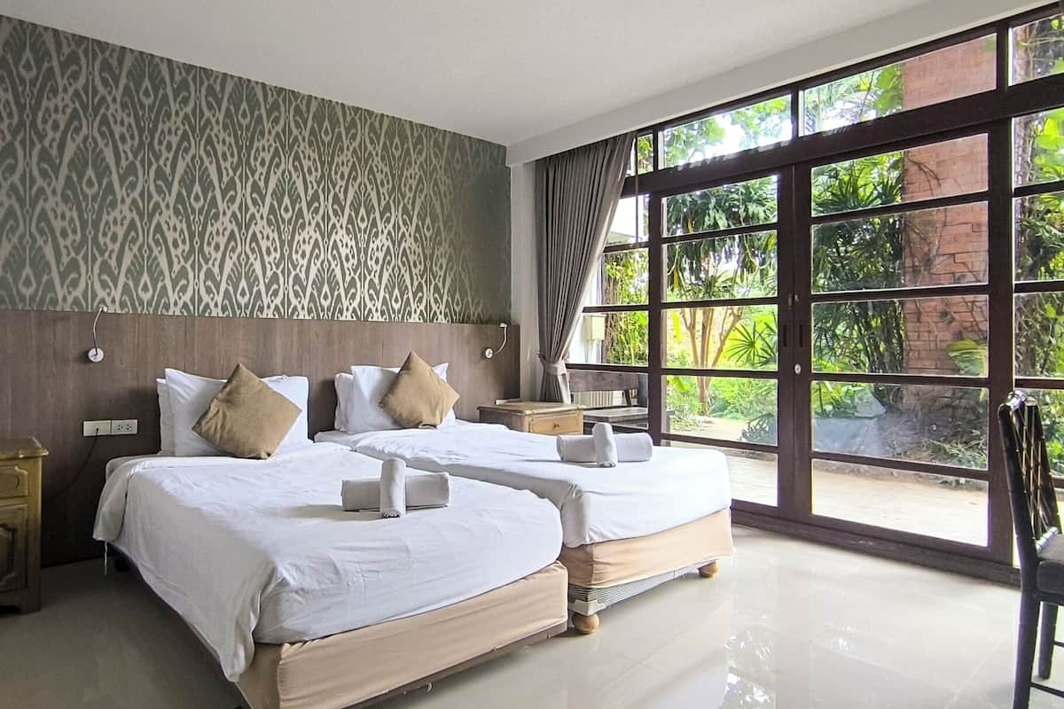 Superior Room with Garden View | Luxe beddengoed, een minibar, gratis wifi, beddengoed